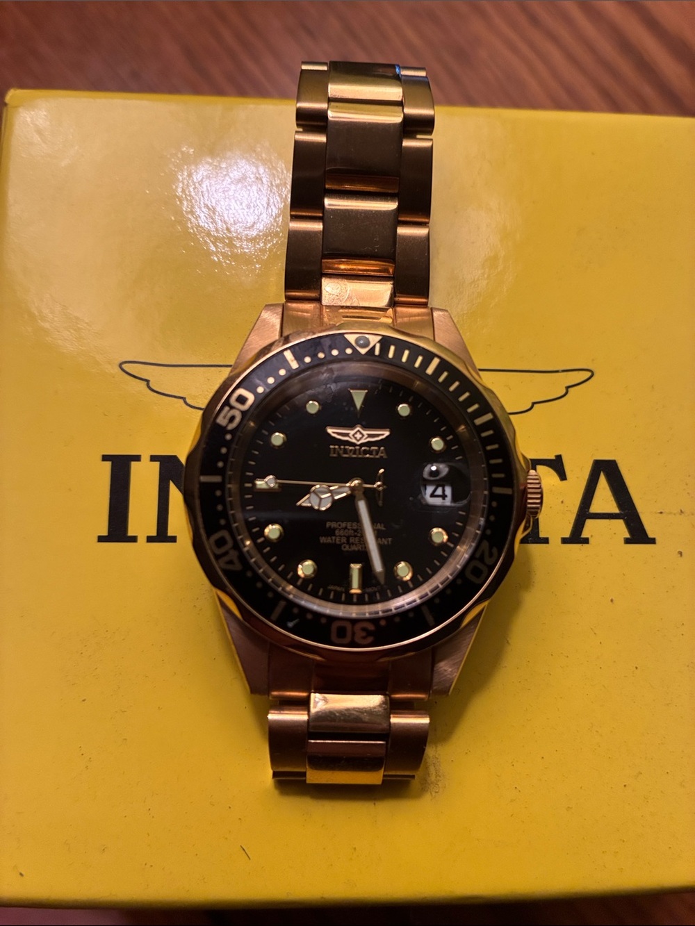 Invicta Gold and Black Men's Diver Watch